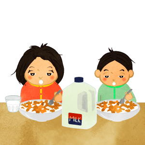 Brother And Sister Just Woke Up And Eating Cereal C