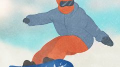 a person skiing on a snowboard with orange and dark light blue wear