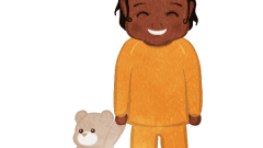 small girl with pajamas 01 d Smiling with a stuffed animal