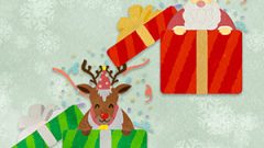 Christmas Santa And Reindeer Coming Out Of A Gift Box